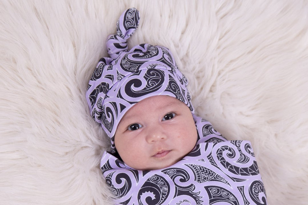 Beautiful baby beanies using Maori designs from nz clothing company Emere.