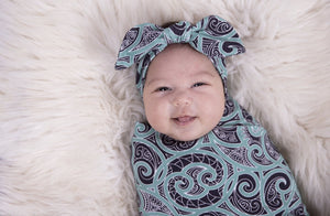 Beautiful baby headbands using Maori designs from nz clothing company Emere.